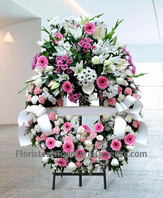 Corona funeraria tonos rosados